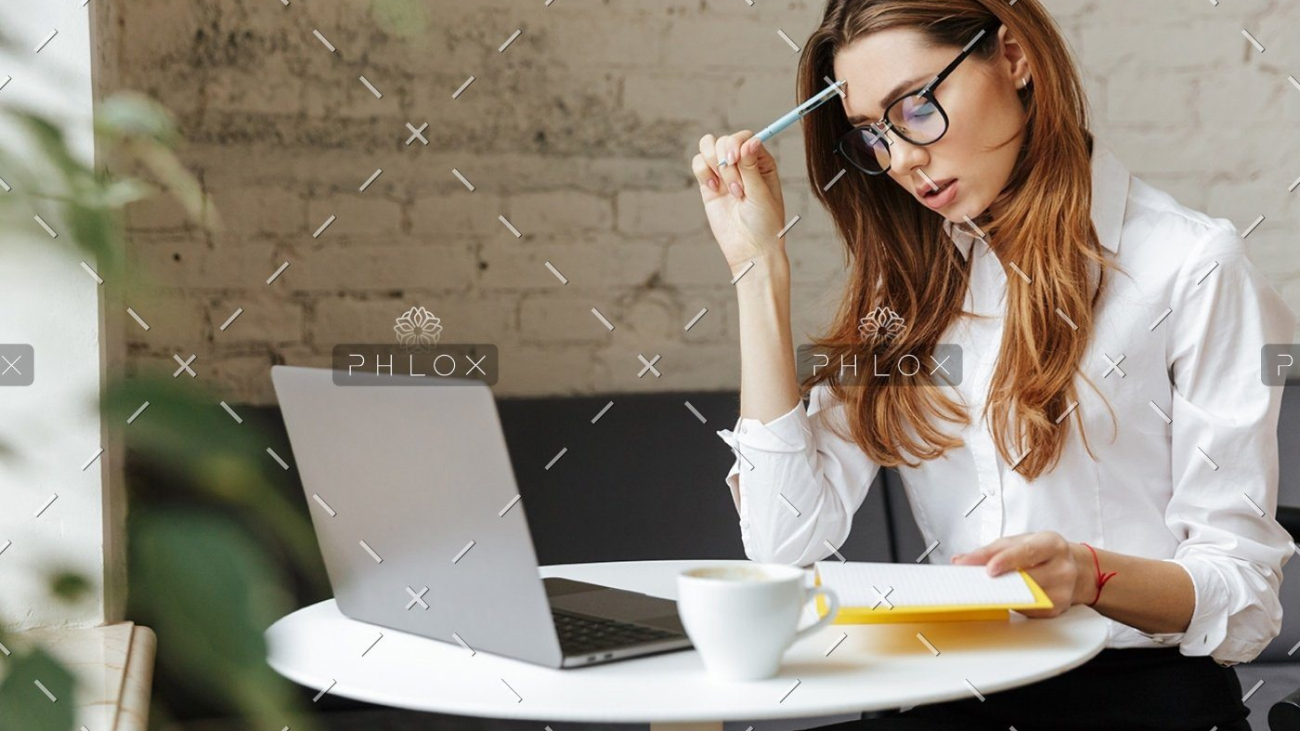 demo-attachment-1151-thoughtful-business-woman-indoors-using-laptop-P5HYUQX